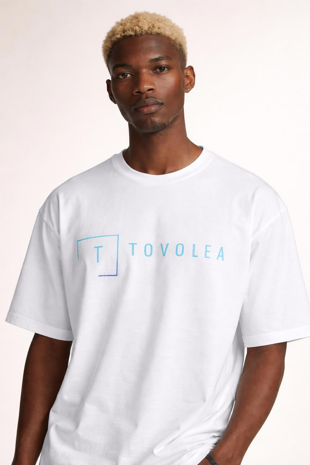 Close-up of the model wearing Tovolea Men’s White Light T-Shirt