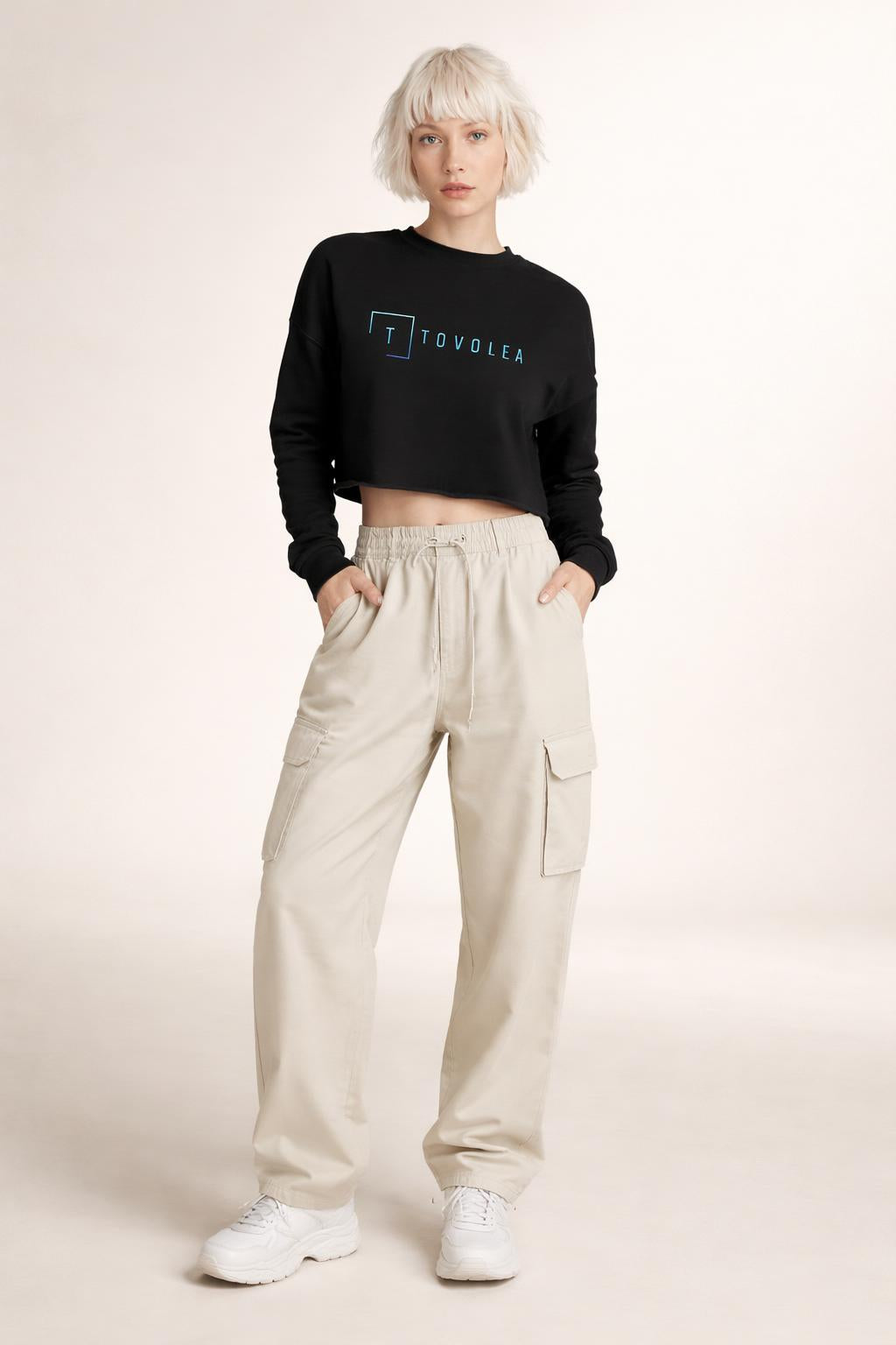 Full body view of the model wearing Tovolea Black Cropped Sweatshirt