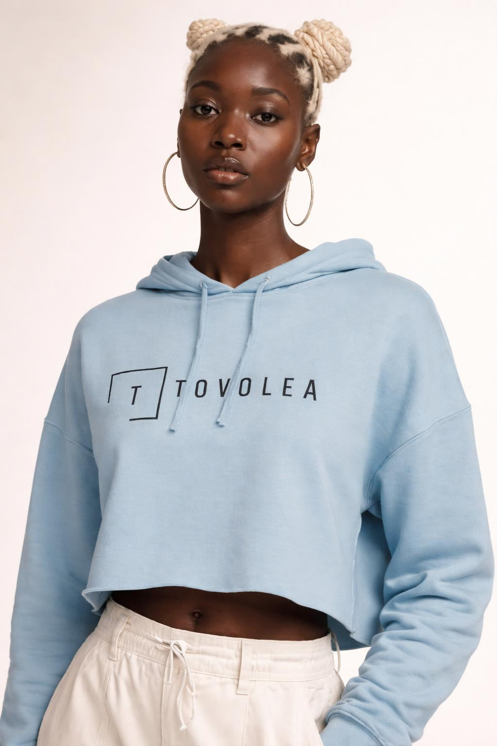 Close-up of the model wearing Tovolea Women’s Sage Cropped Hooded Sweatshirt