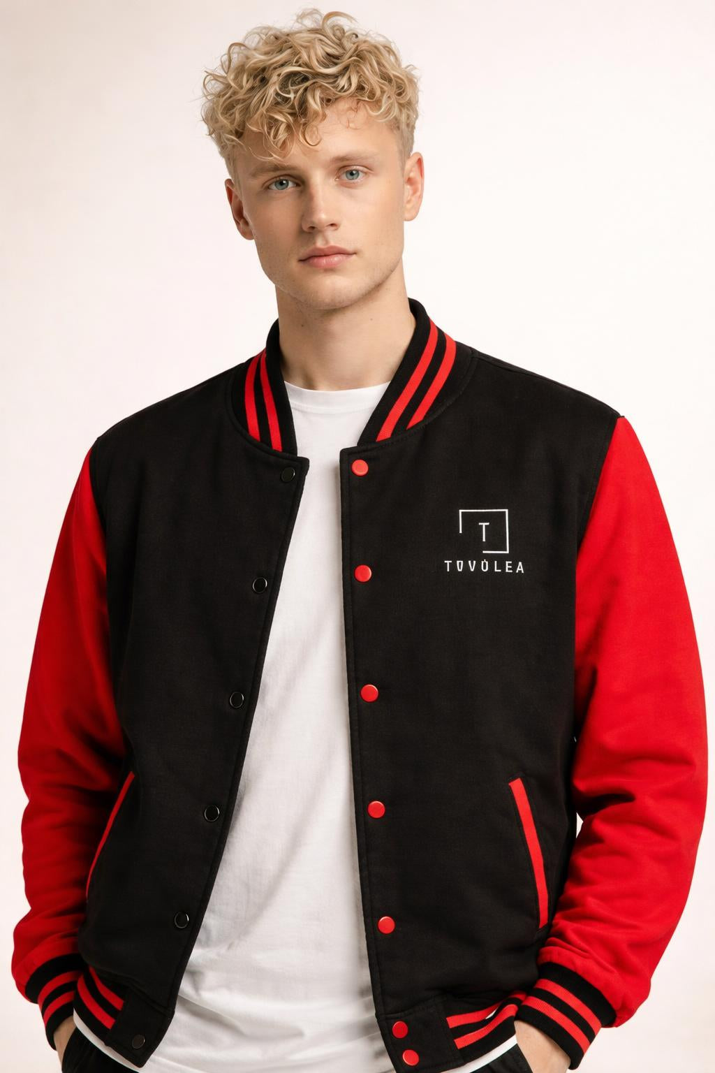 Close-up of the model wearing Tovolea Gents Classic Black & Red Letterman Jacket