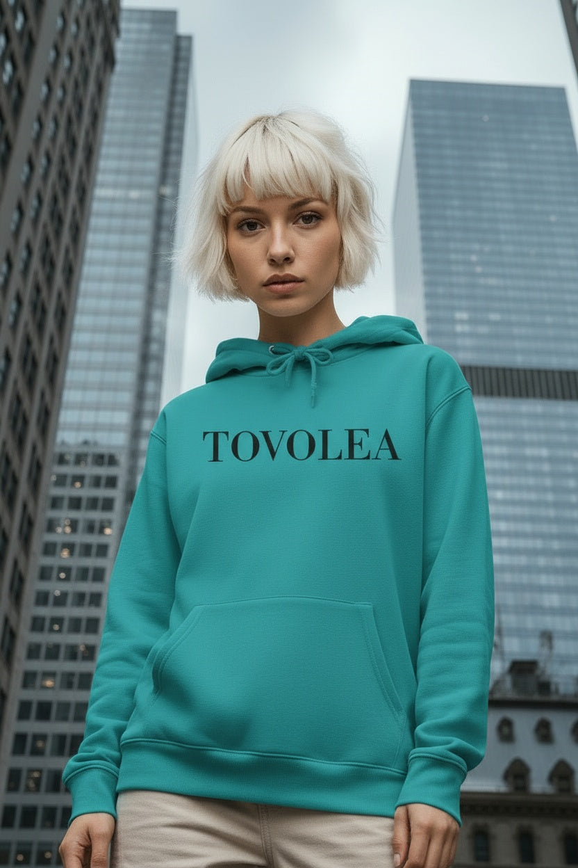 Close-up of the model wearing Tovolea Seafoam Cozy Pullover
