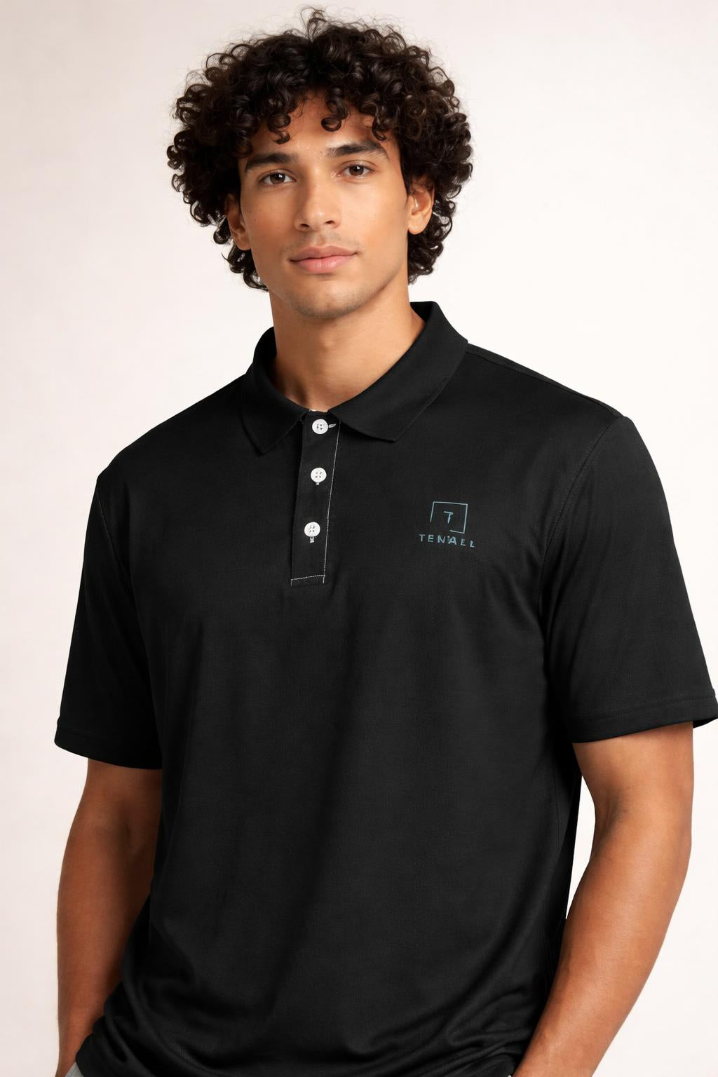 Close-up of the model wearing Tovolea Gents Black Polo Shirt