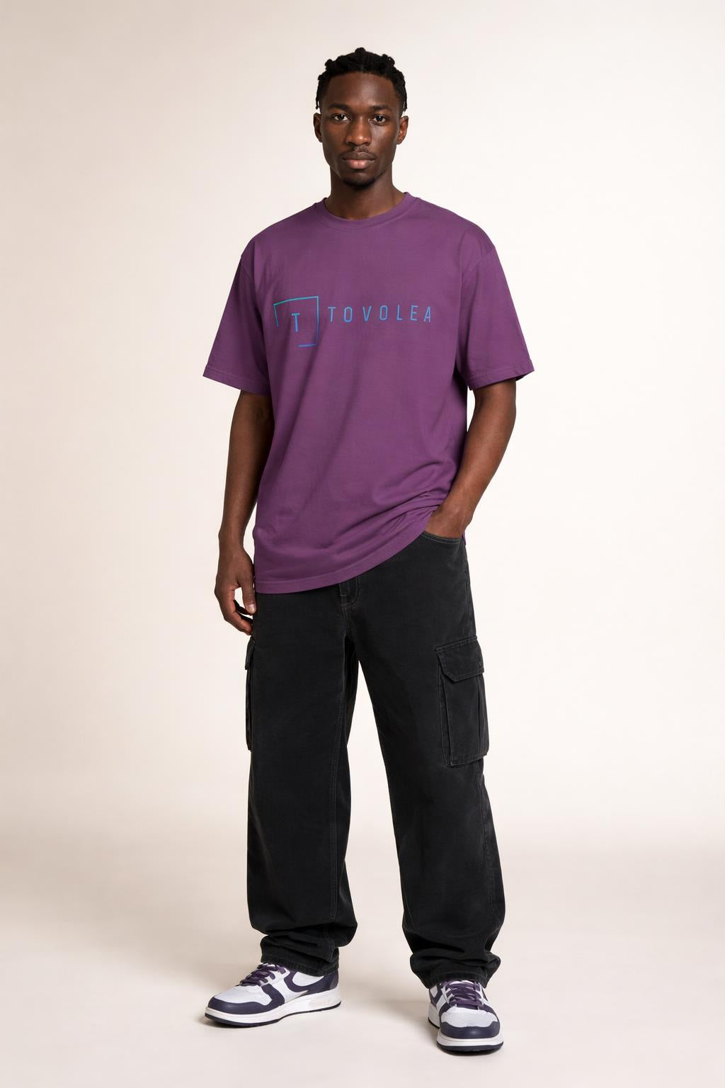 Full body view of the model wearing Tovolea Men’s Berry Light T-Shirt