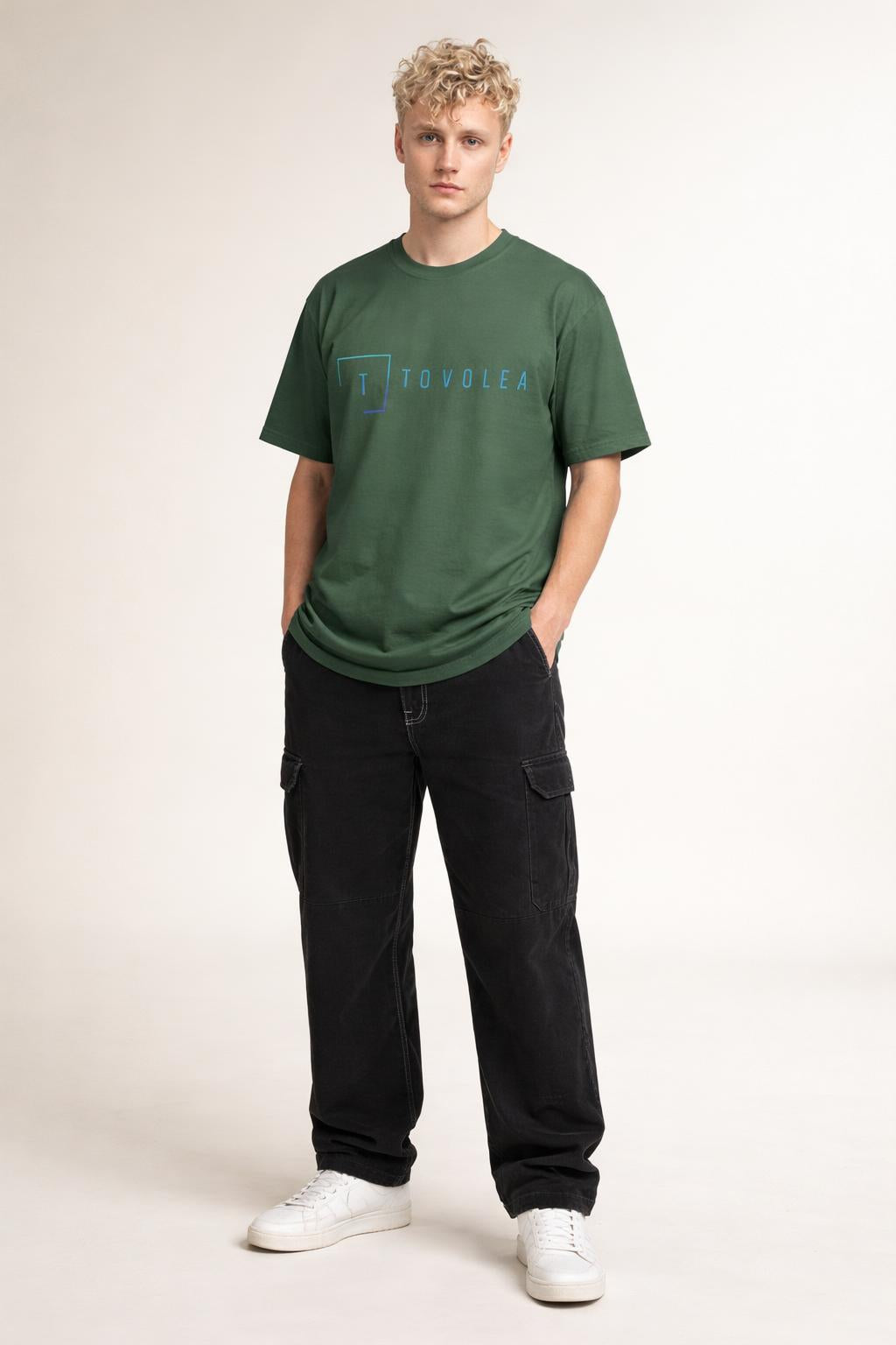 Full body view of the model wearing Tovolea Men’s Turquoise Light T-Shirt