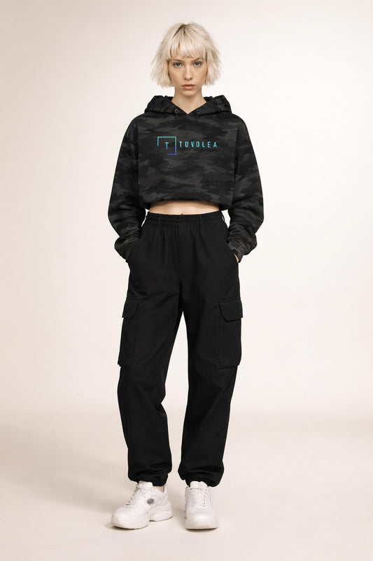 Full body view of the model wearing Tovolea Ladies Black Camo Cropped Hooded Sweatshirt