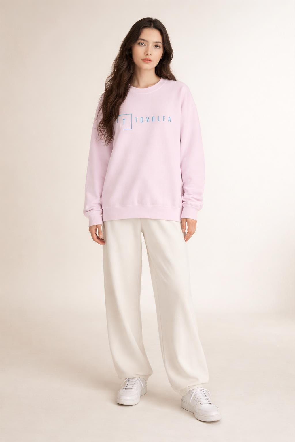 Full body view of the model wearing Tovolea Ladies Pink Crewneck Sweatshirt