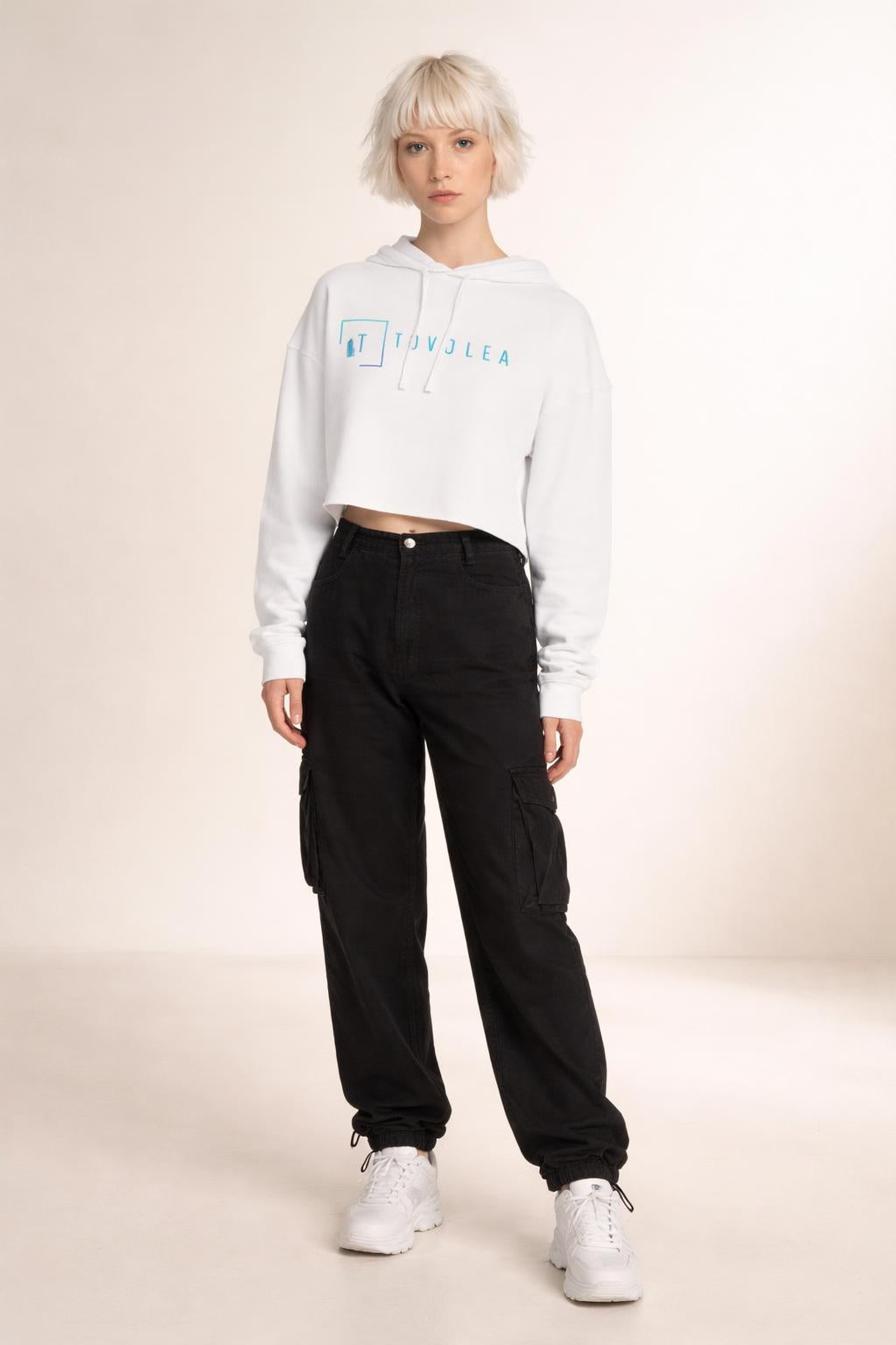 Full body view of the model wearing Tovolea Women’s White Cropped Hooded Sweatshirt