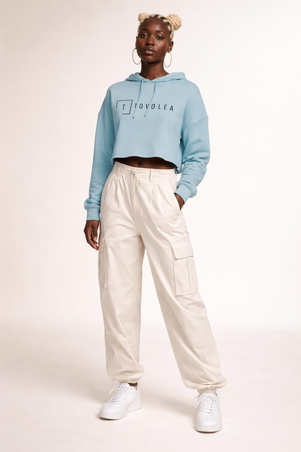 Full body view of the model wearing Tovolea Women’s Sage Cropped Hooded Sweatshirt