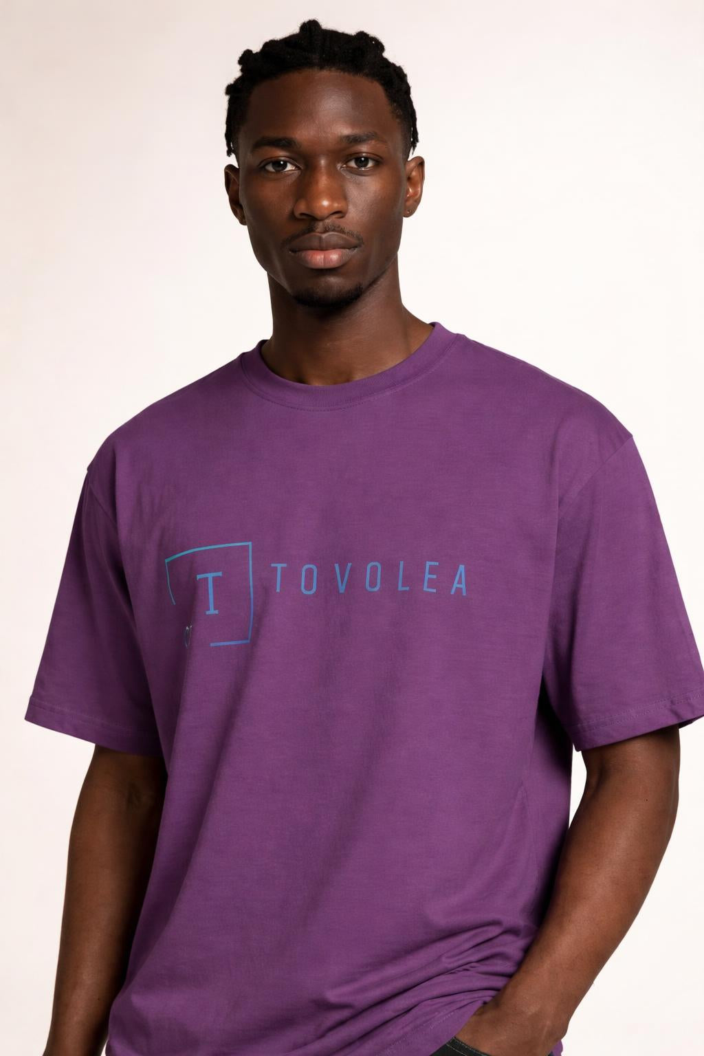 Close-up of the model wearing Tovolea Men’s Berry Light T-Shirt