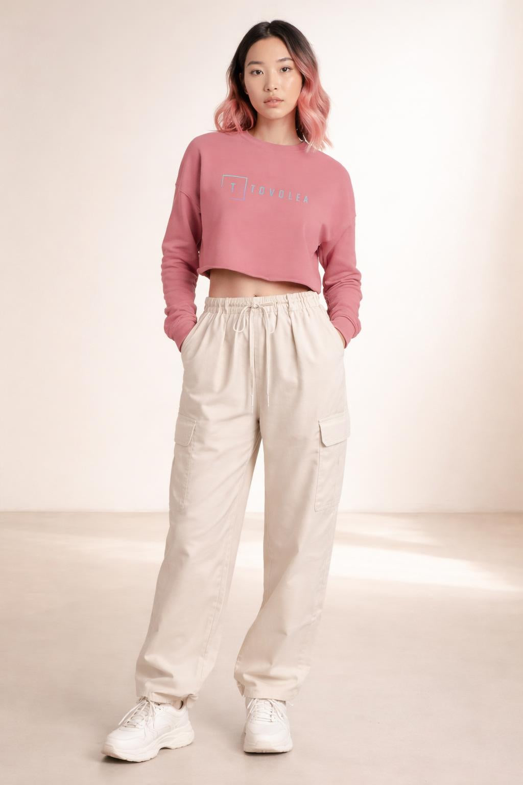 Full body view of the model wearing Tovolea Muave Cropped Sweatshirt