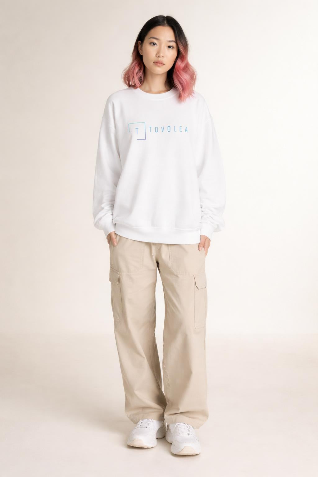 Full body view of the model wearing Tovolea Ladies White Crewneck Sweatshirt