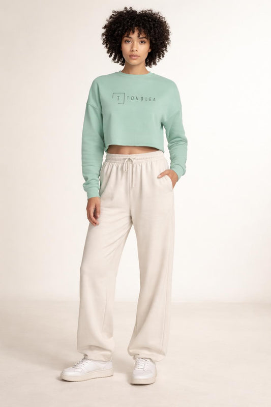 Full body view of the model wearing Tovolea Dusty Blue Cropped Sweatshirt
