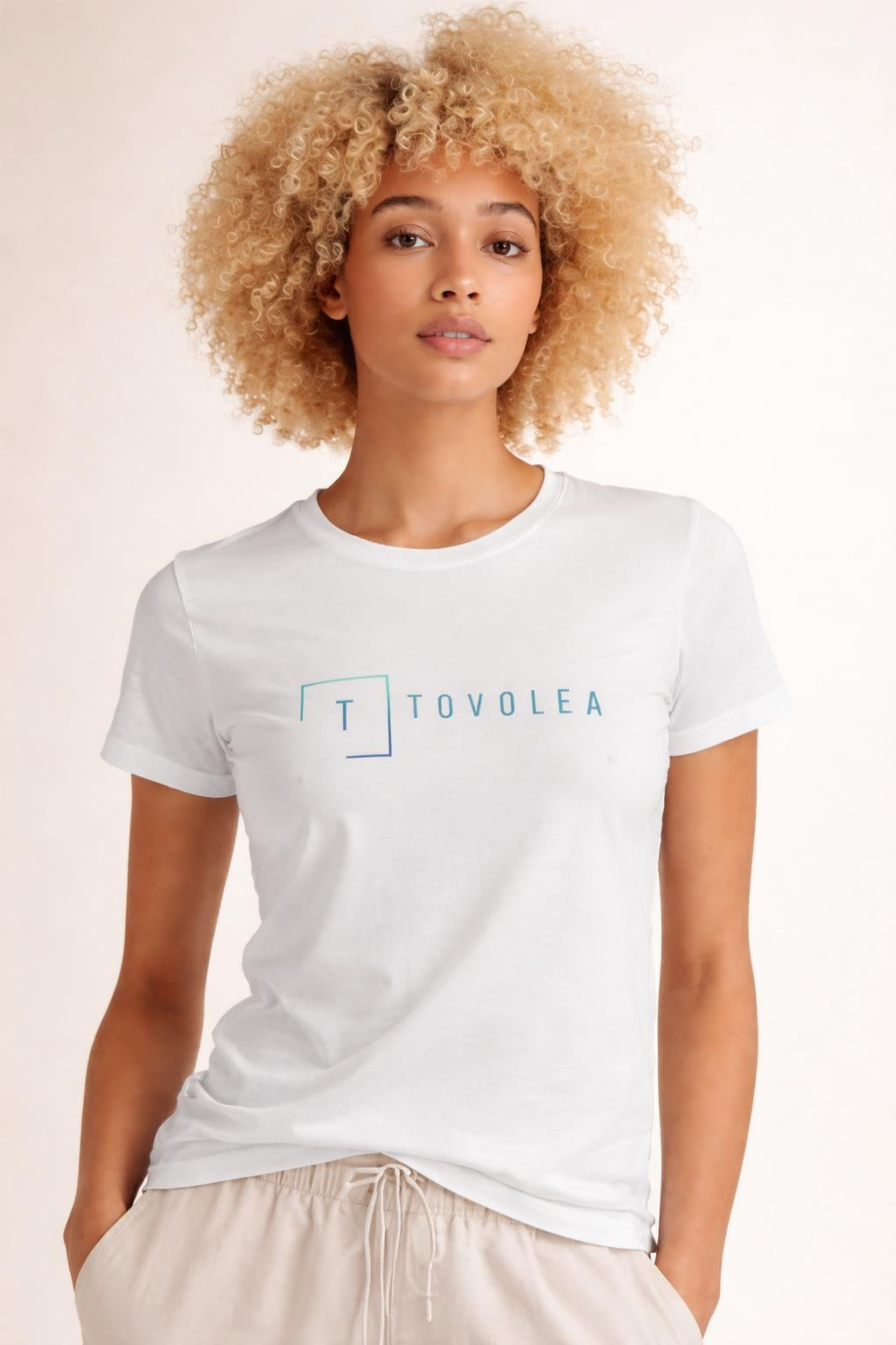 Close-up of the model wearing Tovolea Women's White Light T-Shirt