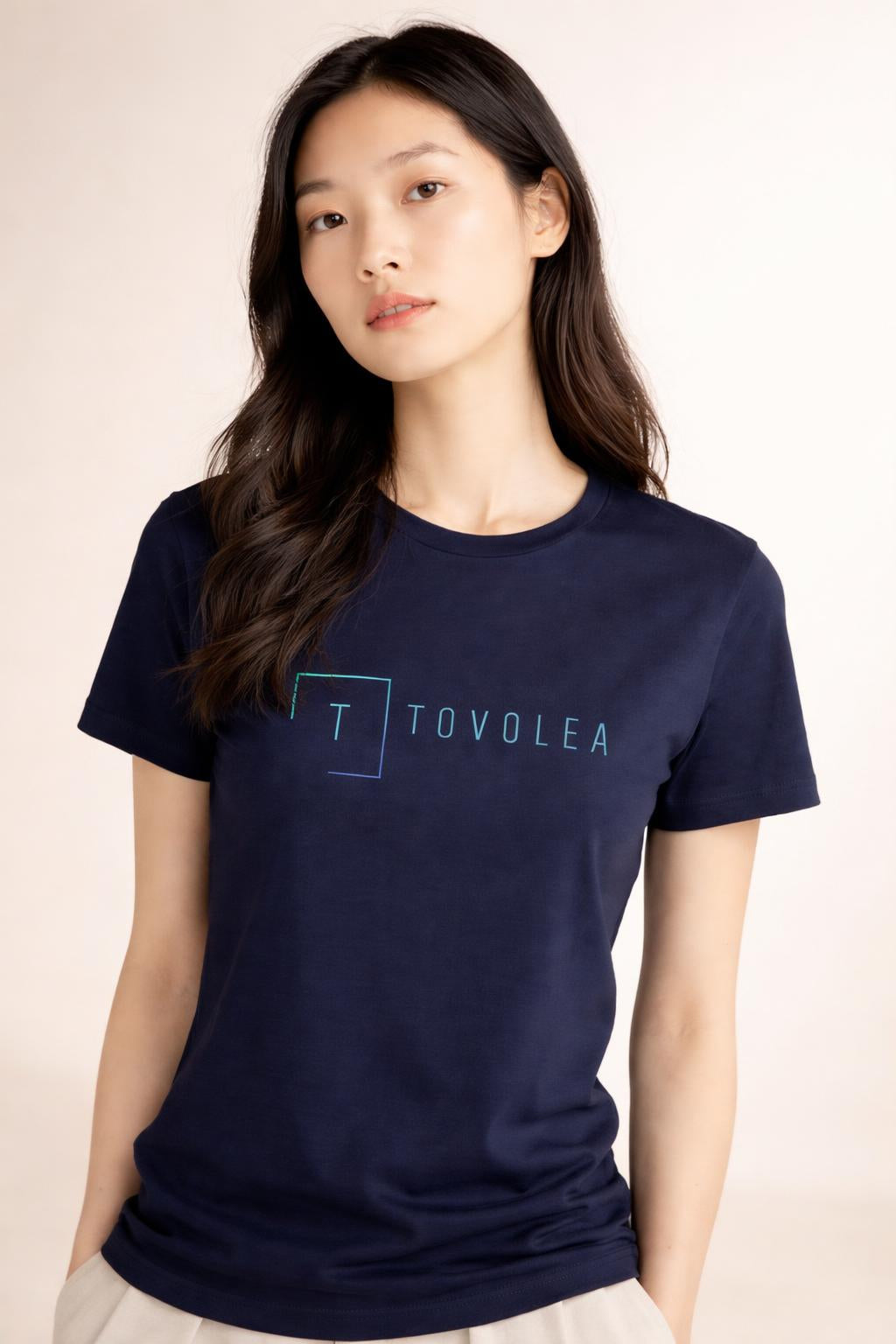 Close-up of the model wearing Tovolea Women's Navy Blue Light T-Shirt