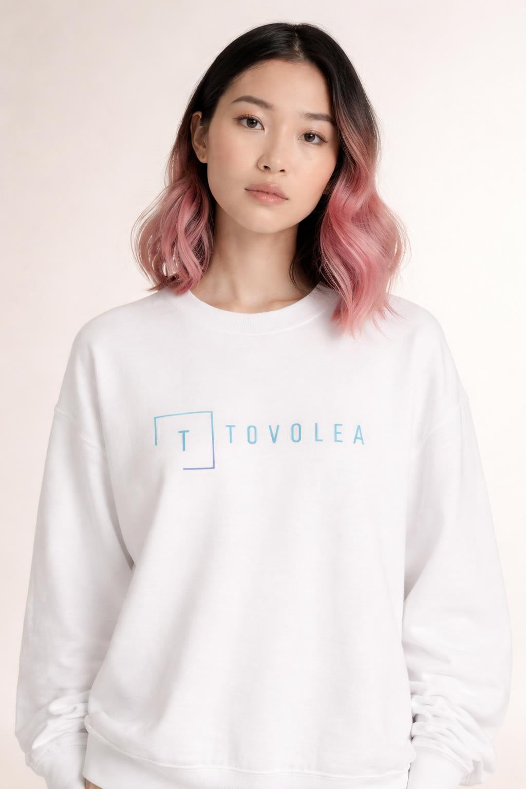 Close-up of the model wearing Tovolea Ladies White Crewneck Sweatshirt
