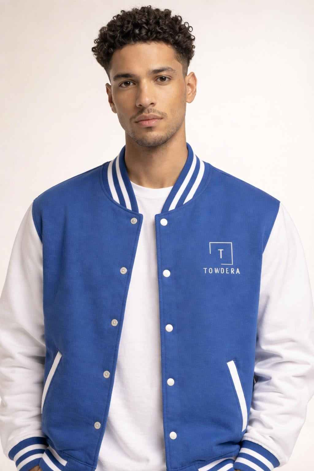 Close-up of the model wearing Tovolea Gents Classic Blue & White Letterman Jacket