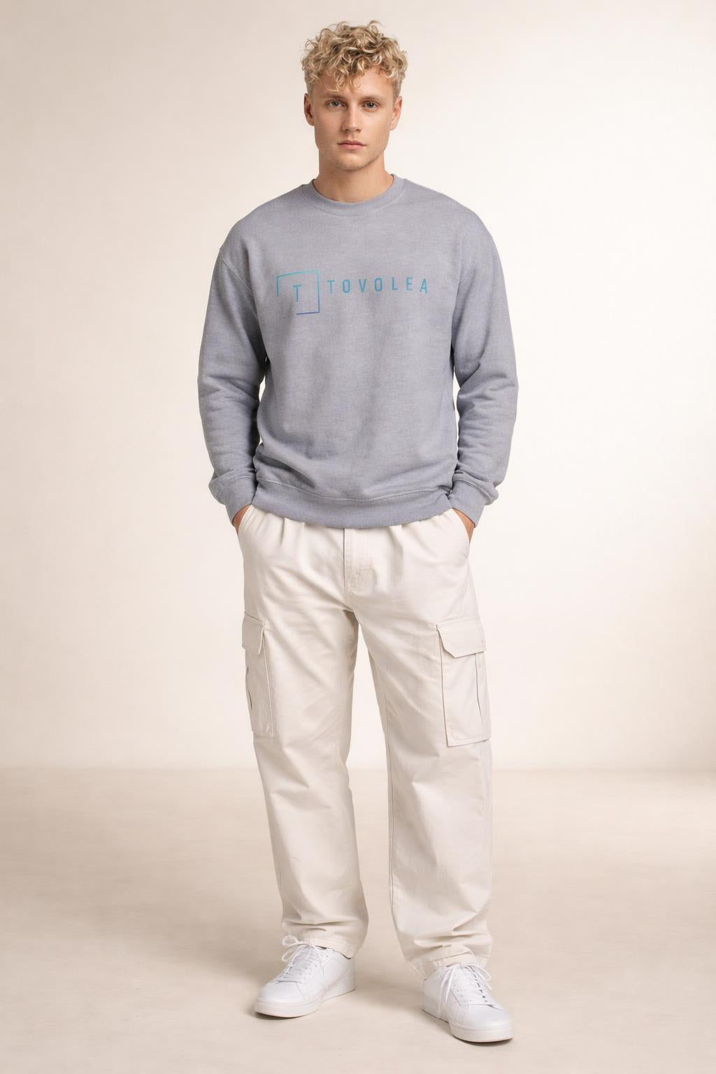 Full body view of the model wearing Tovolea Men’s Grey Crewneck Sweatshirt