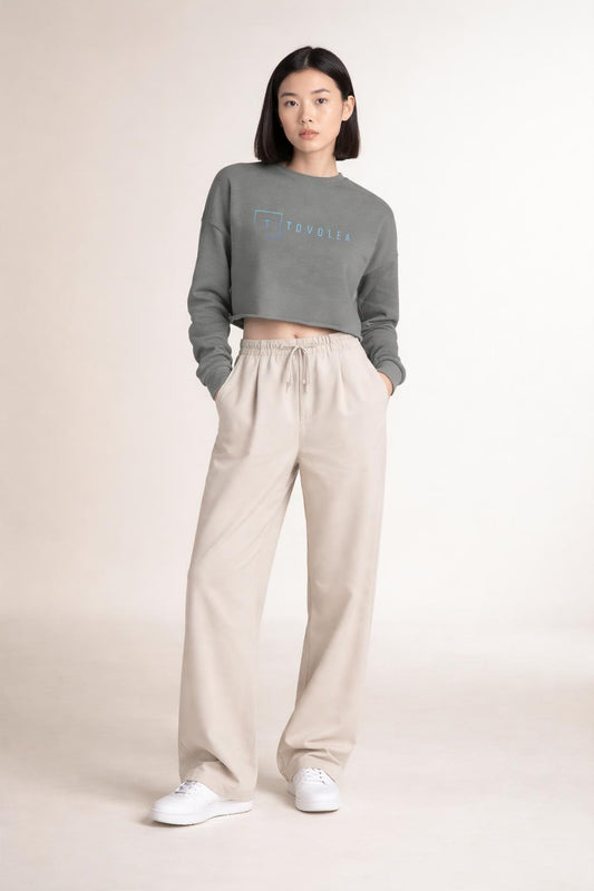 Full body view of the model wearing Tovolea Deep Heather Cropped Sweatshirt