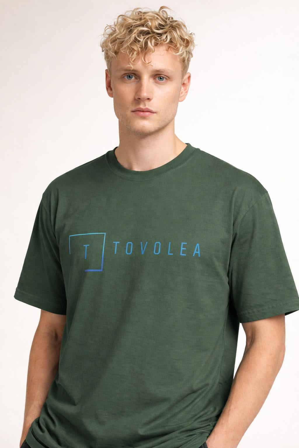 Close-up of the model wearing Tovolea Men’s Turquoise Light T-Shirt