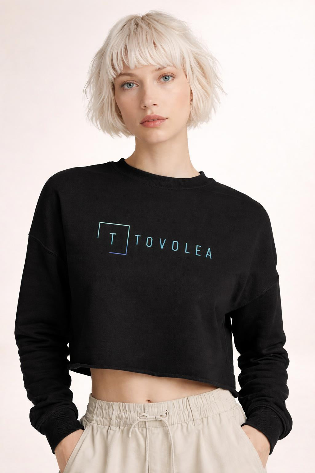Close-up of the model wearing Tovolea Black Cropped Sweatshirt