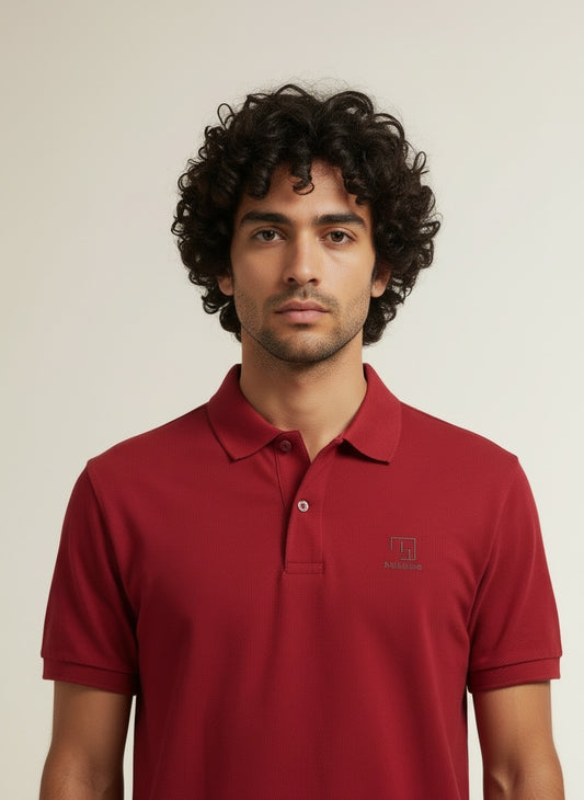 Close-up of the model wearing Tovolea Gents Red Polo Shirt