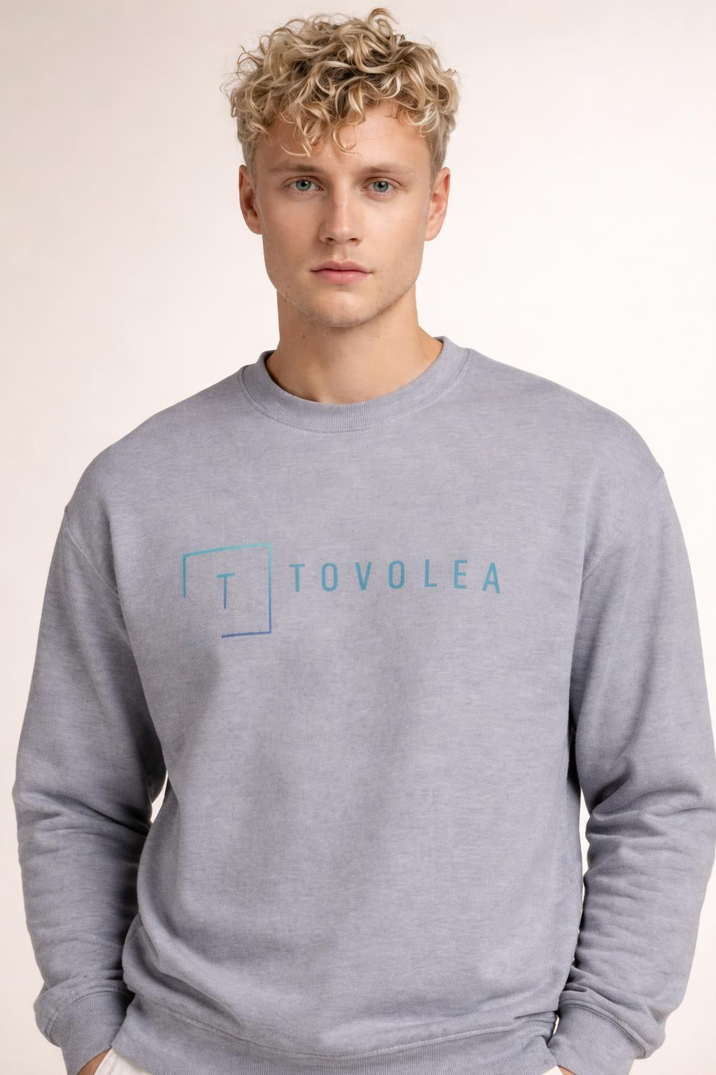 Close-up of the model wearing Tovolea Men’s Grey Crewneck Sweatshirt