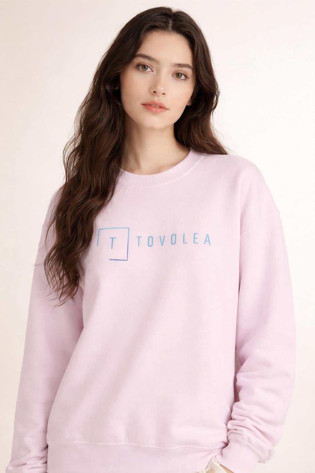 Close-up of the model wearing Tovolea Ladies Pink Crewneck Sweatshirt