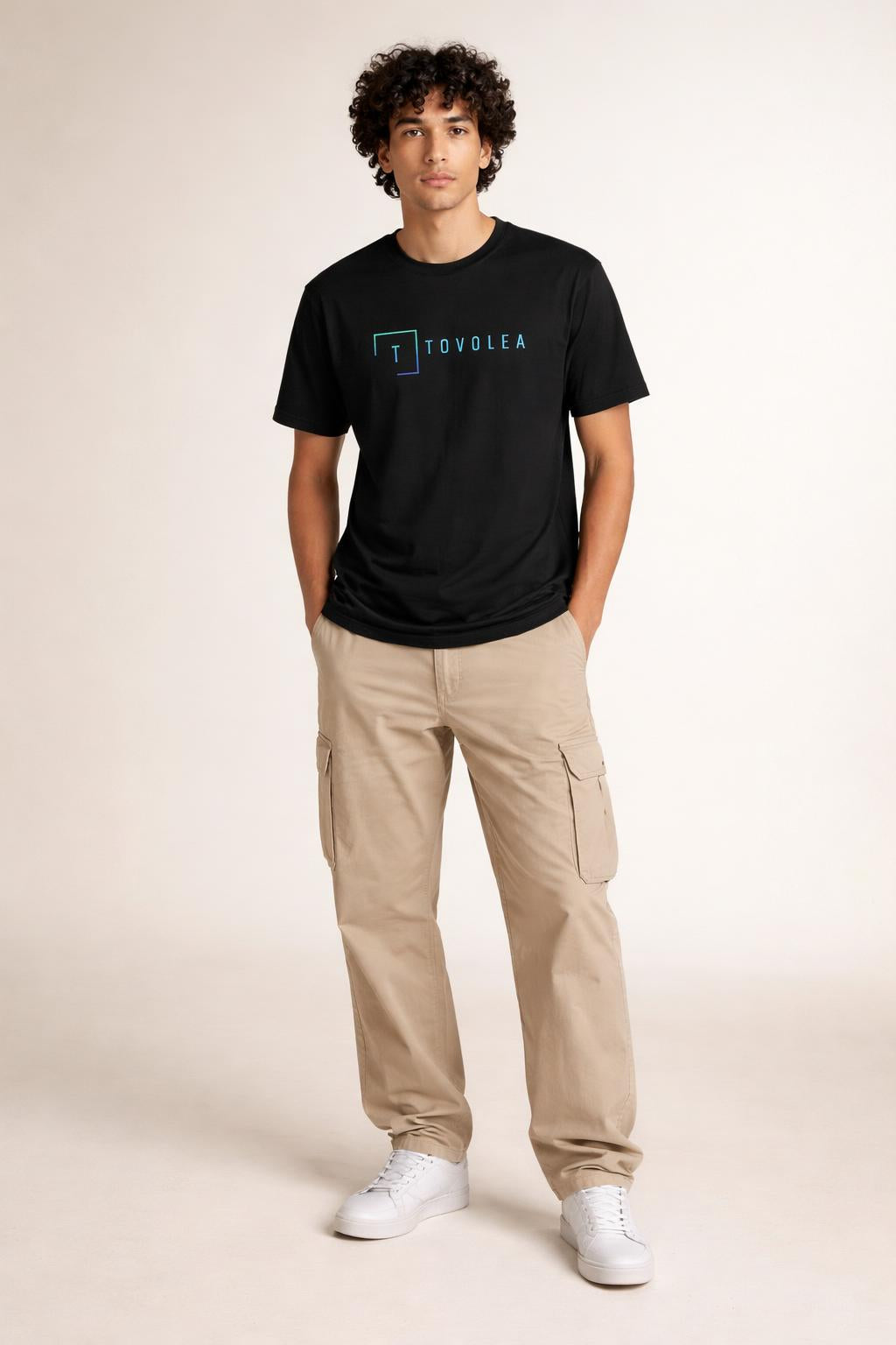 Full body view of the model wearing Tovolea Men’s Black Cotton Crewneck T-Shirt