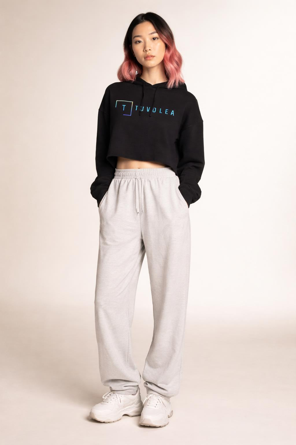 Full body view of the model wearing Tovolea Women’s Black Cropped Hooded Sweatshirt