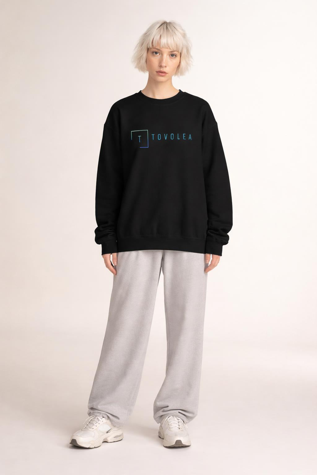 Full body view of the model wearing Tovolea Ladies Black Crewneck Sweatshirt