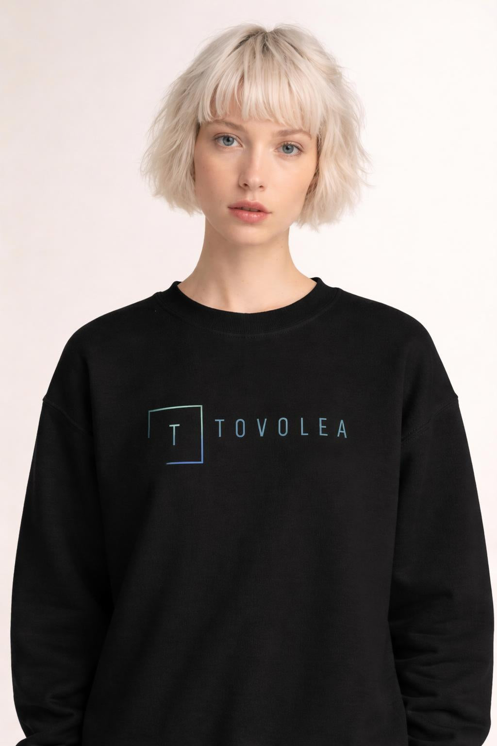 Close-up of the model wearing Tovolea Ladies Black Crewneck Sweatshirt