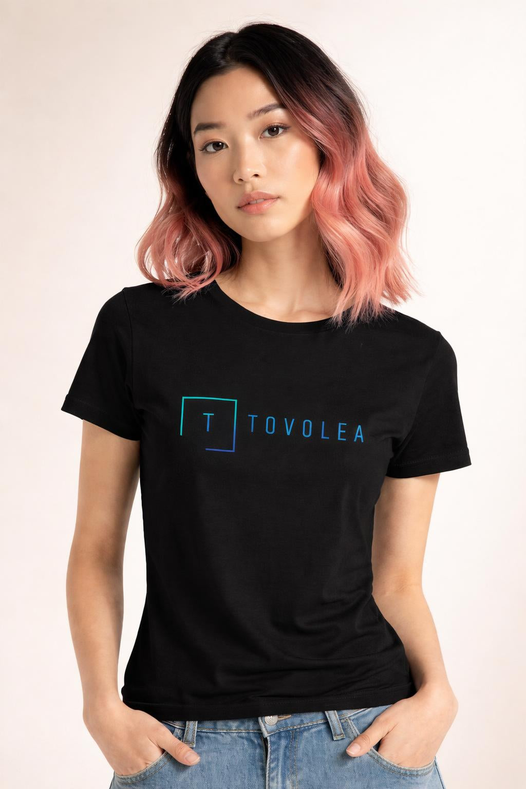 Close-up of the model wearing Tovolea Women's Black Light T-Shirt