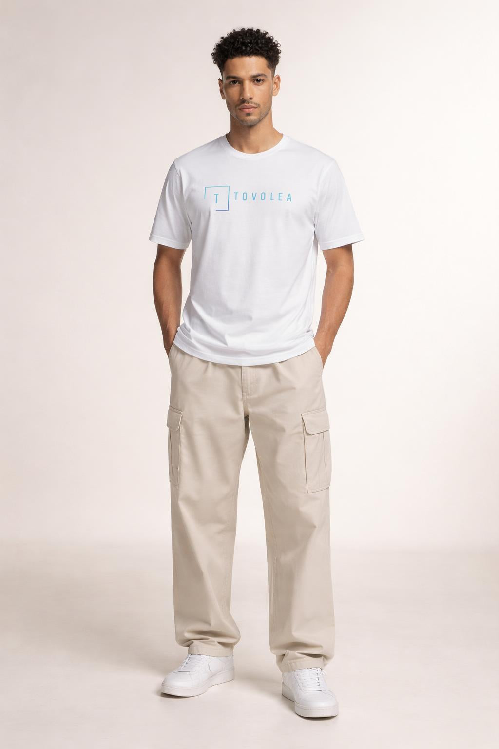 Full body view of the model wearing Tovolea Men’s White Cotton Crewneck T-Shirt